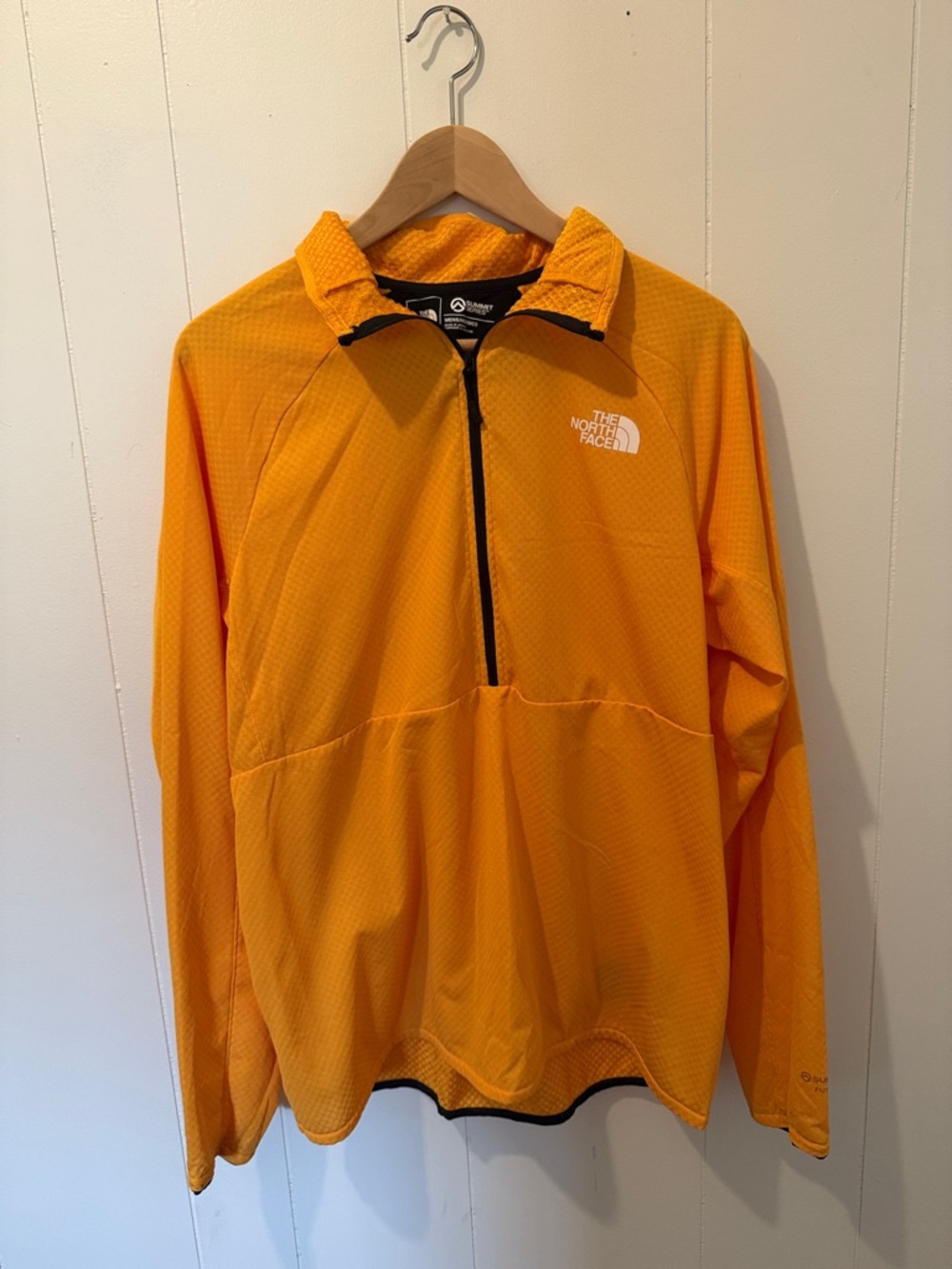 The North Face Orange and Black Summit Series Fleece Pullover